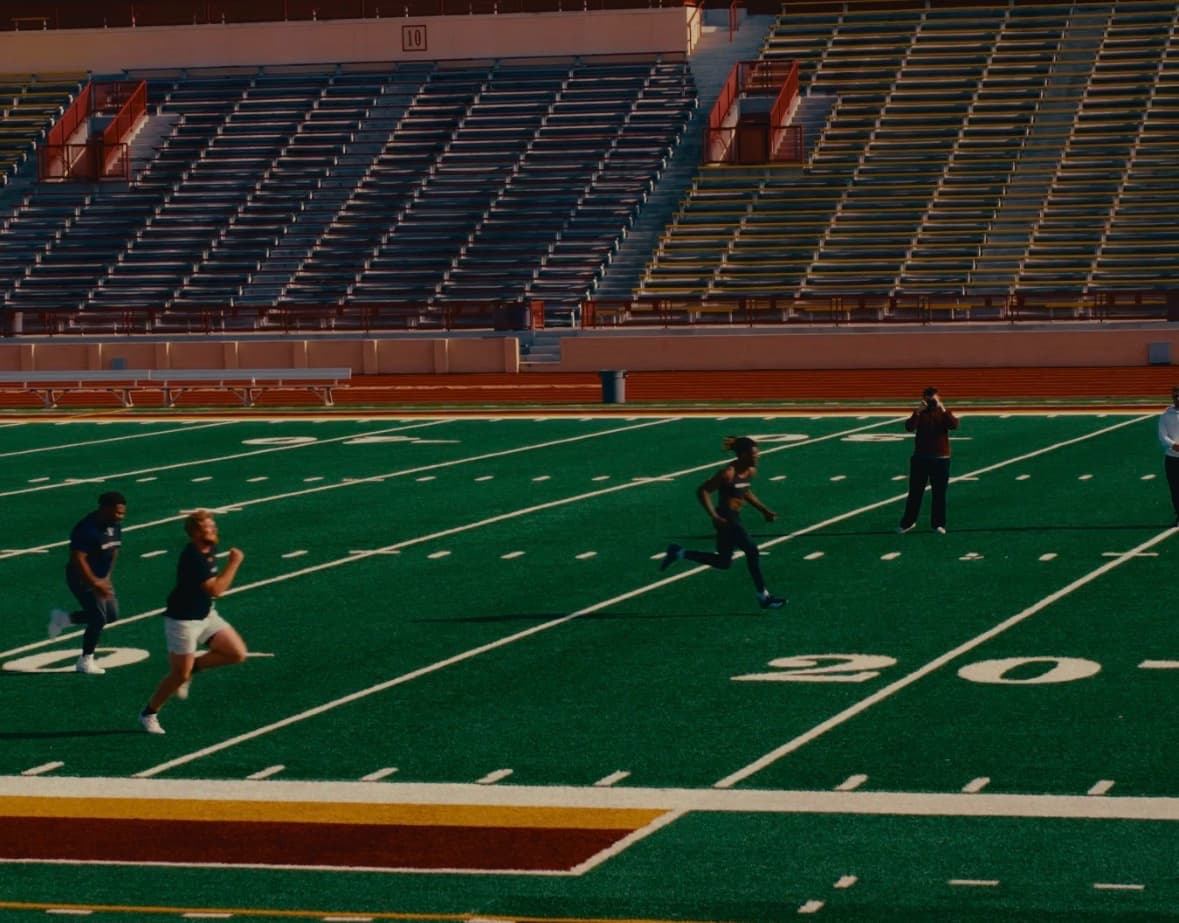 Athletes sprinting on the field during combine prep with G6 Performance Sacramento