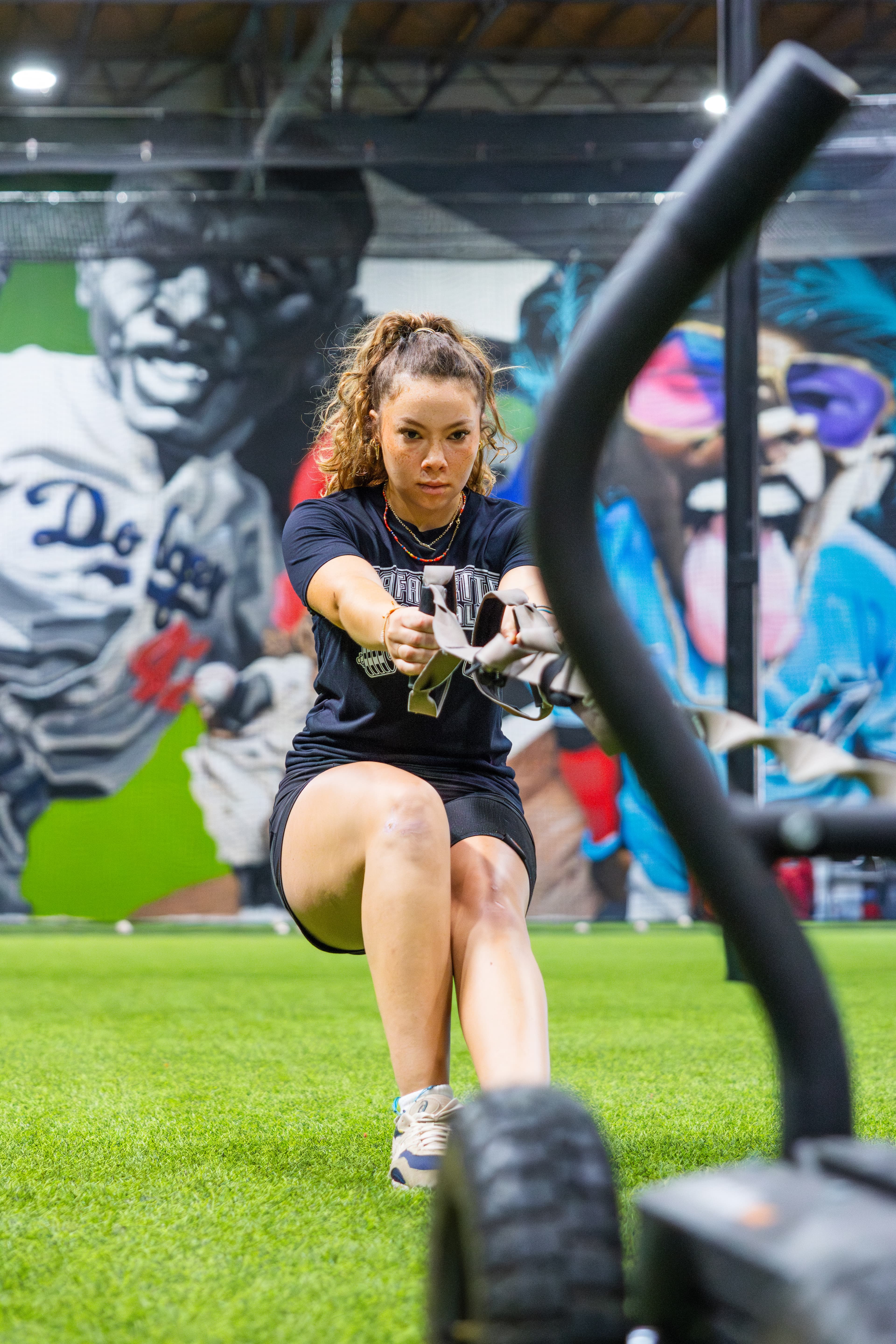 Softball athlete training with battle ropes at G6 Performance Sacramento