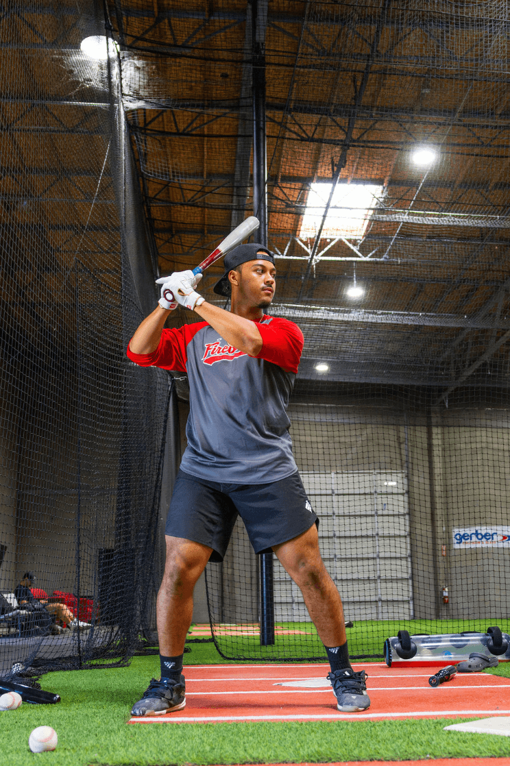 Baseball hitter training at G6 Performance Sacramento indoor cage