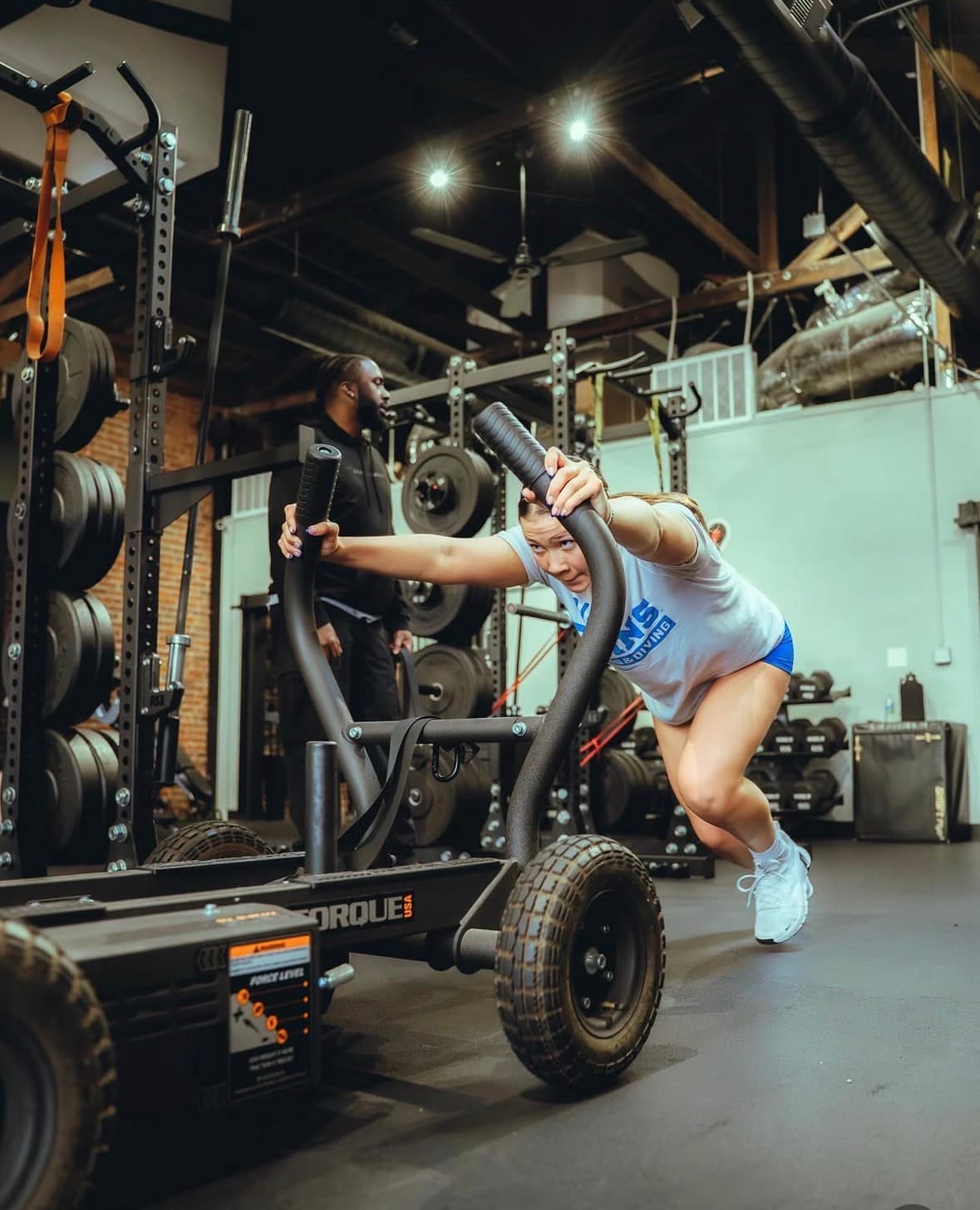 Athlete sled push speed training